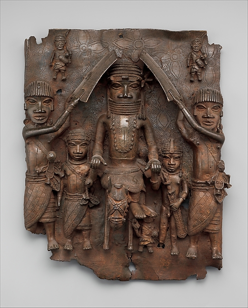 Benin brass plaque showing an equestrian oba with attendants